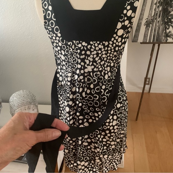 Le Lis Blanc Deux Sleeveless mini dress; black background with cream polka dots - Picture 8 of 9